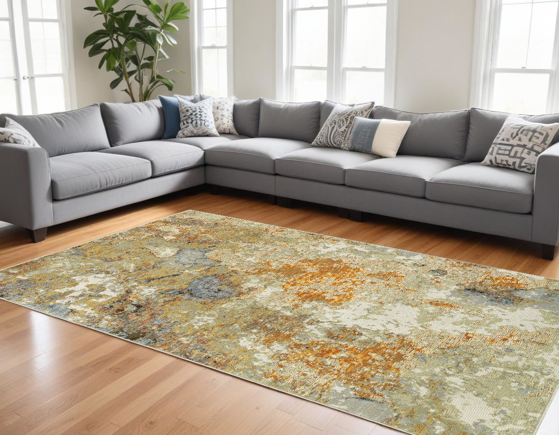7' X 10' Gold and Ivory Power Loom Area Rug